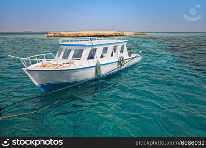 snorkeling boat close to coral reef