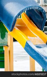 snow and ice covered playground