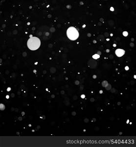 Snow background - snowflakes over night dark sky