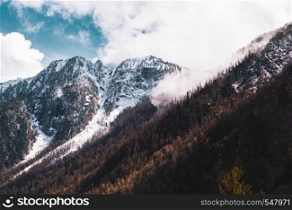 snow-capped mountain peaks of the Altai mountains against the sky.. snow-capped mountain peaks of the Altai mountains against the sky