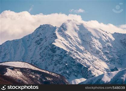 snow-capped mountain peaks of the Altai mountains against the sky.. snow-capped mountain peaks of the Altai mountains against the sky