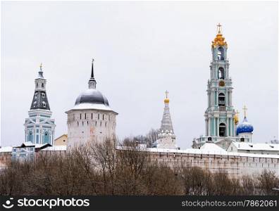 Snow-covered domes of Holy Trinity-Sergius Lavra in winter time. Sergiev Posad, Moscow region, Russia. Golden Ring of Russia