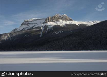 Snow covered landscape with mountain in winter, Emerald Lake, Field, British Columbia, Canada