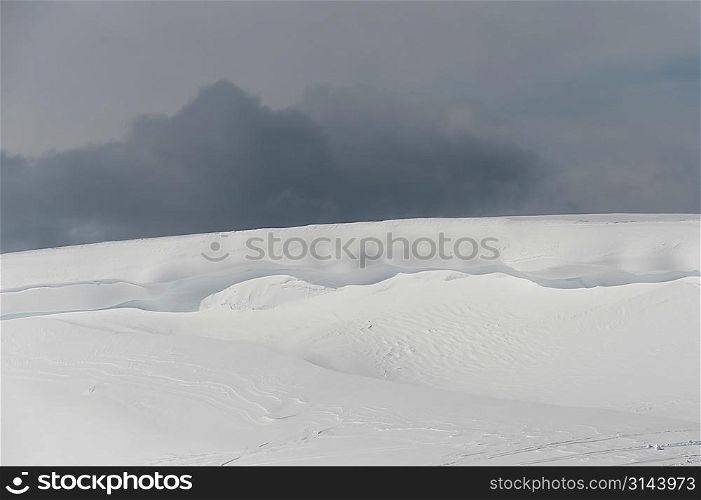 Snow covered mountain with clouds, Whistler, British Columbia, Canada