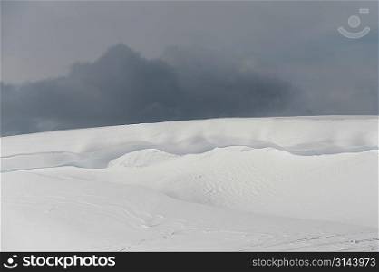Snow covered mountain with clouds, Whistler, British Columbia, Canada