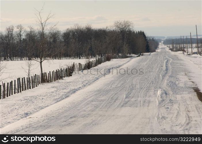 Snow covered road in Alberta Canada