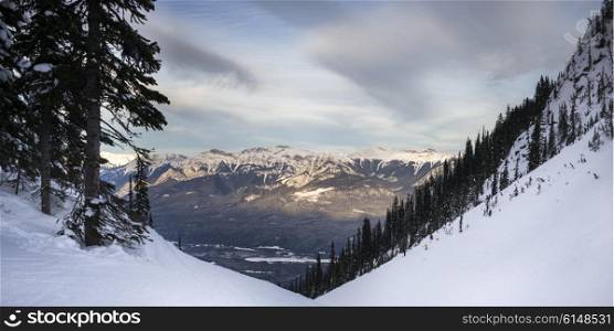 Snow covered valley with mountains in winter, Kicking Horse Mountain Resort, Golden, British Columbia, Canada