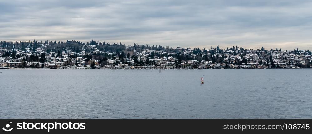 Snow covers rooftops of homes in Renton, Washington.