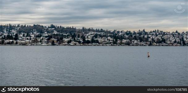 Snow covers rooftops of homes in Renton, Washington.