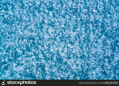 Snow crystals on the ice floor at Lake Baikal in Russia