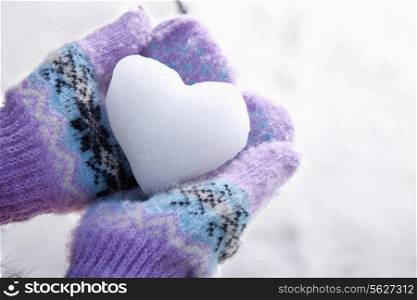 Snow Heart in Hands with Mittens