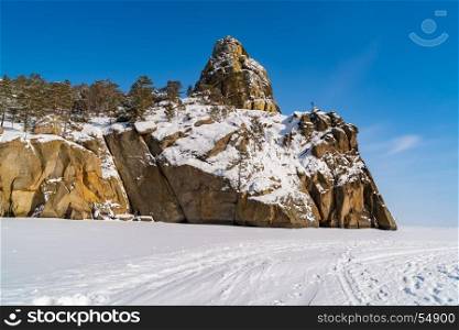 Snow mountain at frozen Lake Baikal, Russia