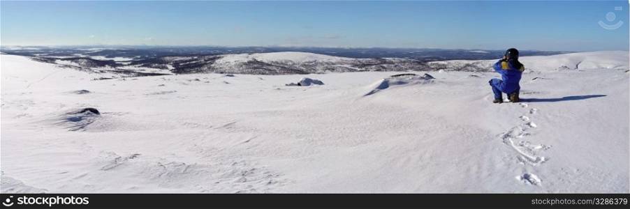 Snow mountain blue sky panorama taking by photographer