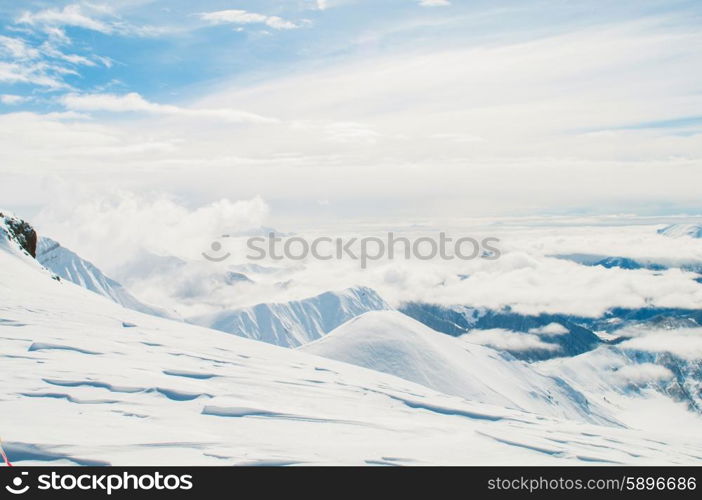 Snow mountains on bright winter day