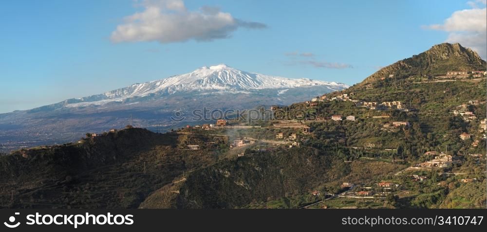 Snow peak of Etna volcano, Sicily, seen from Taormina