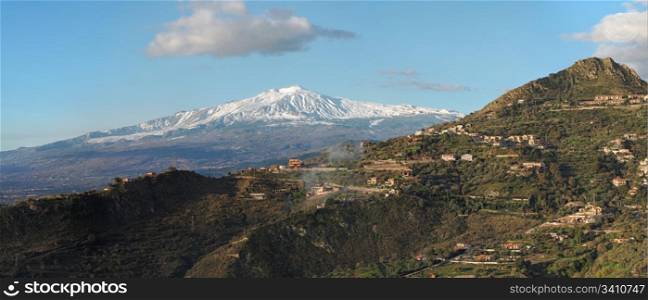 Snow peak of Etna volcano, Sicily, seen from Taormina