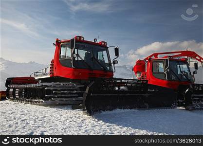 Snow plows in mountains