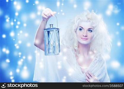 Snow queen with a latern