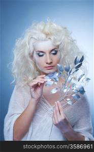 Snow queen with a magic twig