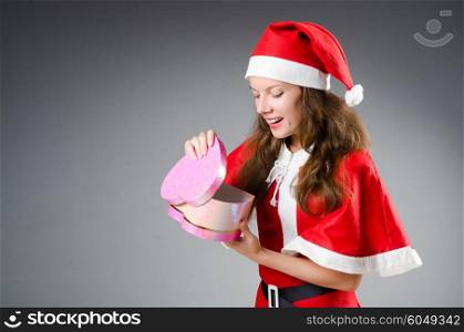 Snow santa girl in christmas concept