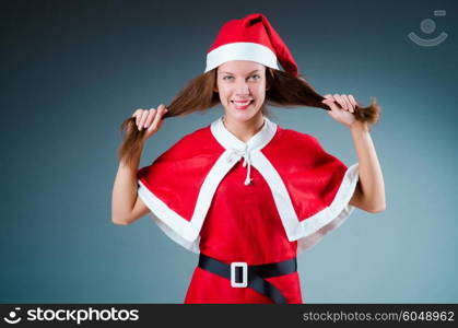 Snow santa girl in red costume