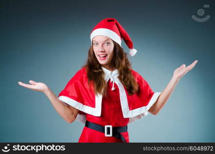 Snow santa girl in red costume