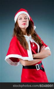 Snow santa girl in red costume