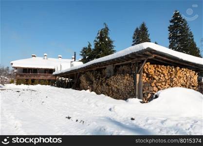 Snow shed for storing firewood