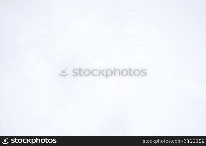 Snow texture in blue tone. Snowy nature winter background. Background of fresh snow
