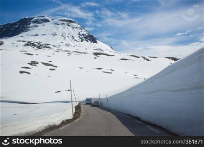 snow walls around a mountain road at the Norway
