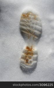 snow white soil single boot footprint winter