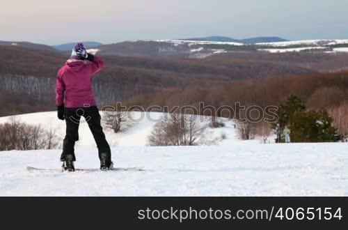 snowboarder getting ready to descend from the mountain Ai-Petri, Crimea