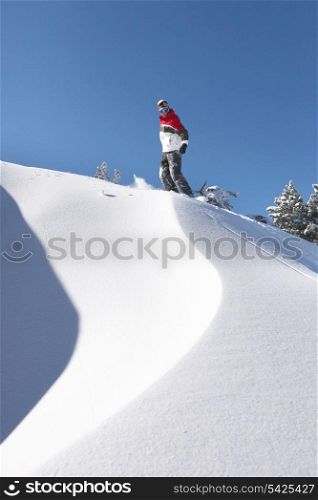 Snowboarder on piste