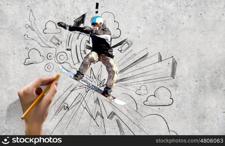 Snowboarding. Close up of hand drawing sketches of snowboarder