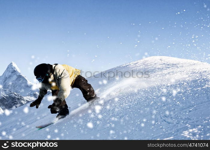 Snowboarding. Snowboarder making jump high in clear sky