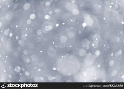 Snowfall background. Background of snow flurry falling in winter with some motion blur