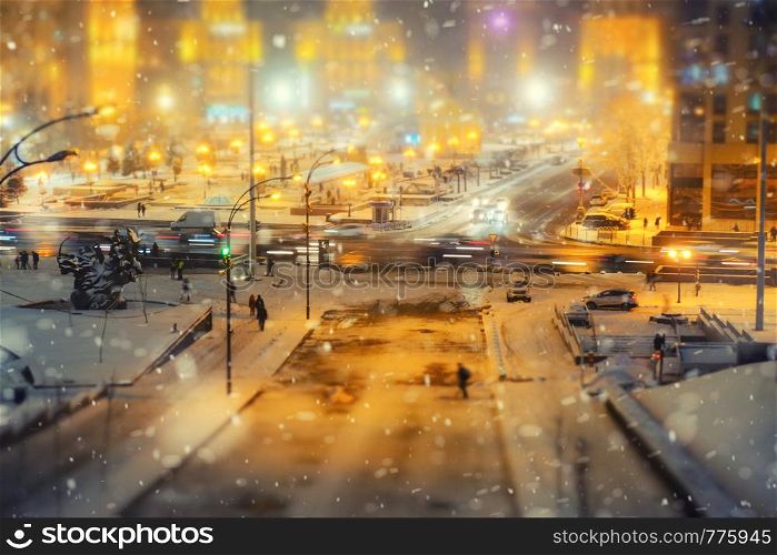 Snowfall on Independence square in Kiev, Ukraine. Night winter skyline. Snowfall on Independence square in Kiev, Ukraine.