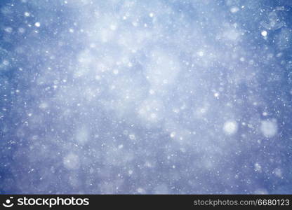 Snowfall texture of snowflakes on blurry background design weather