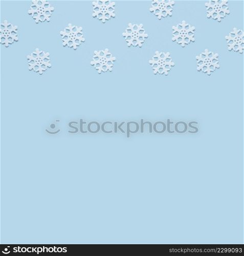 snowflake baby blue background with copy space