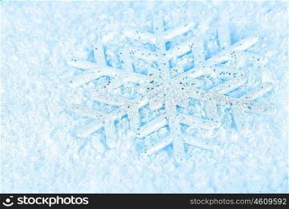 Snowflake, blue winter holiday background, christmas tree ornament &amp; snow decoration
