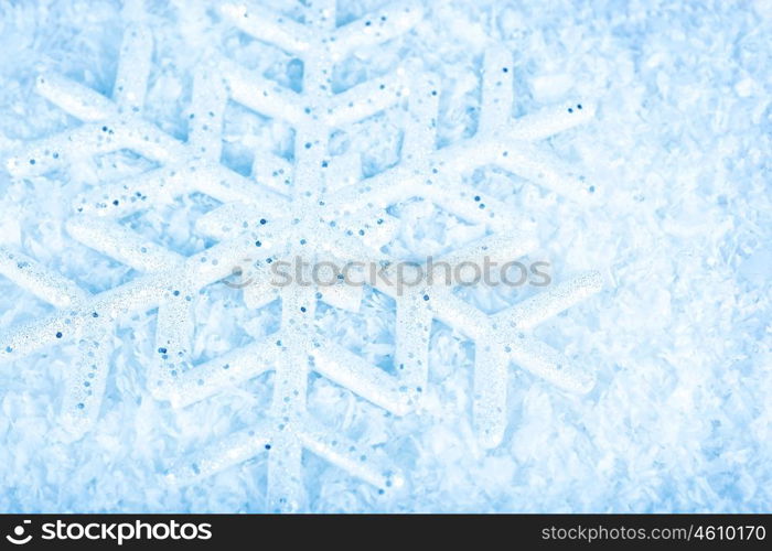 Snowflake, blue winter holiday background, christmas tree ornament &amp; snow decoration