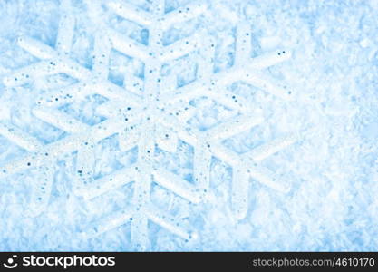 Snowflake, blue winter holiday background, christmas tree ornament &amp; snow decoration