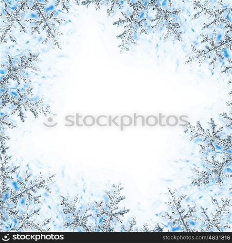 Snowflake decorative frame, beautiful blue cold frozen snow background, Christmas tree ornament and decoration, winter holidays abstract border with text space