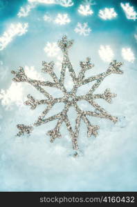 Snowflake on a Blue Holiday background ...