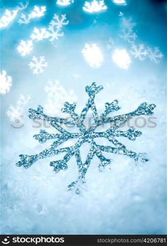Snowflake on a Blue Holiday background ...