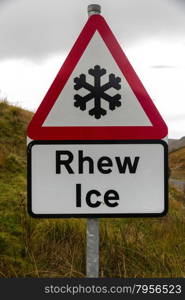 Snowflake triangular warning sign, Wales, warning of Ice, Welsh bilingual Rhew, United Kingdom