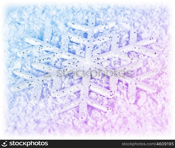 Snowflake winter holiday background, Christmas tree ornament and decoration, big blue pink snow flake card, abstract winter natural texture pattern, seasonal nature