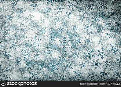 Snowflakes background for Christmas. Snowflake pattern made ??of icing sugar on wooden table. Top view