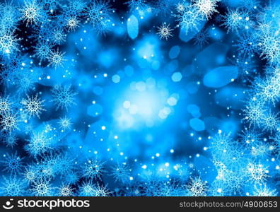 Snowflakes on blue. Background conceptual image with white snowflakes on blue background