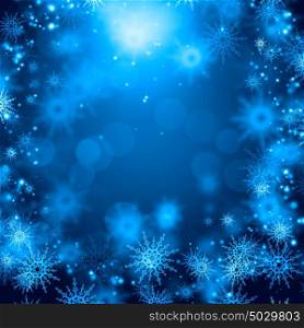 Snowflakes on blue. Background conceptual image with white snowflakes on blue background